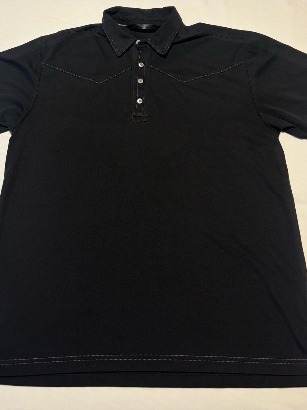 Travis Mathew Black Polo with Contrast Stitching